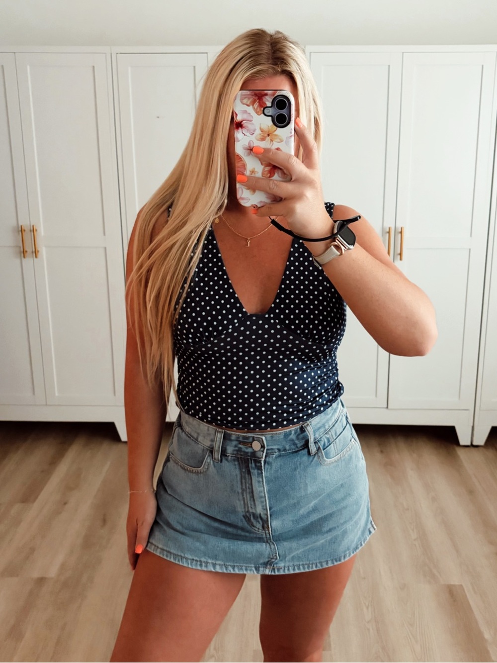 Navy blue and white polka dot tank top